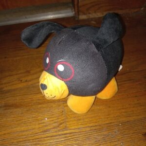 Black and Orange Plush Dog Toy